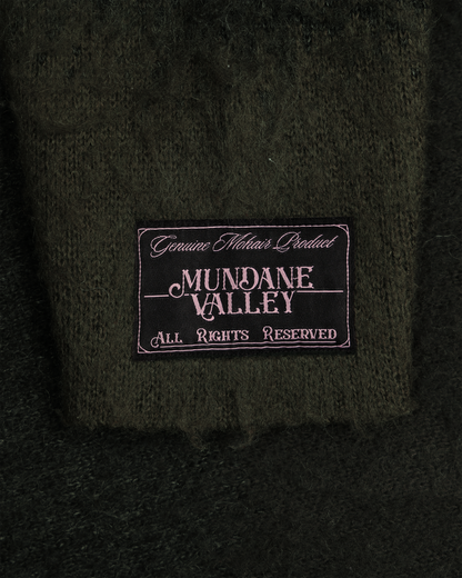 Pull ras du cou en tricot brossé